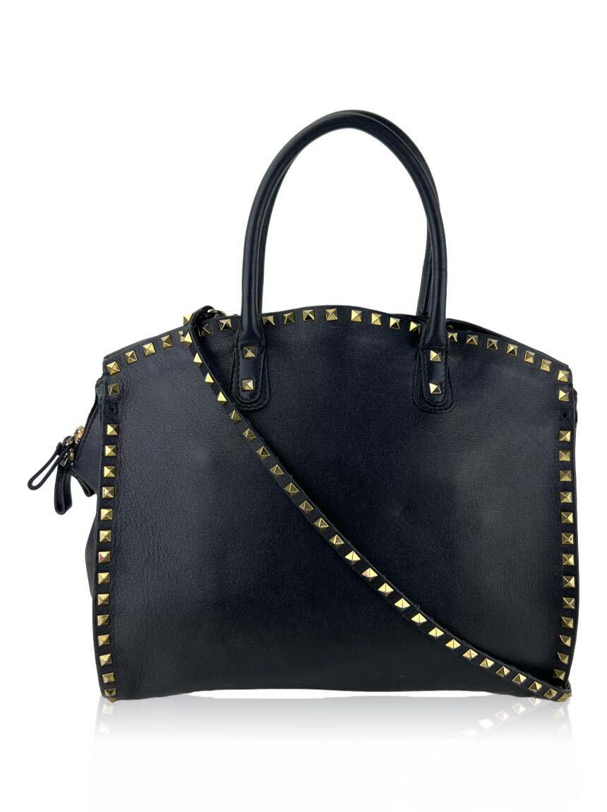 valentino com alca valentino rockstud dome shopper couro preta black