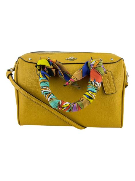 bolsa-com-alca-coach-mini-